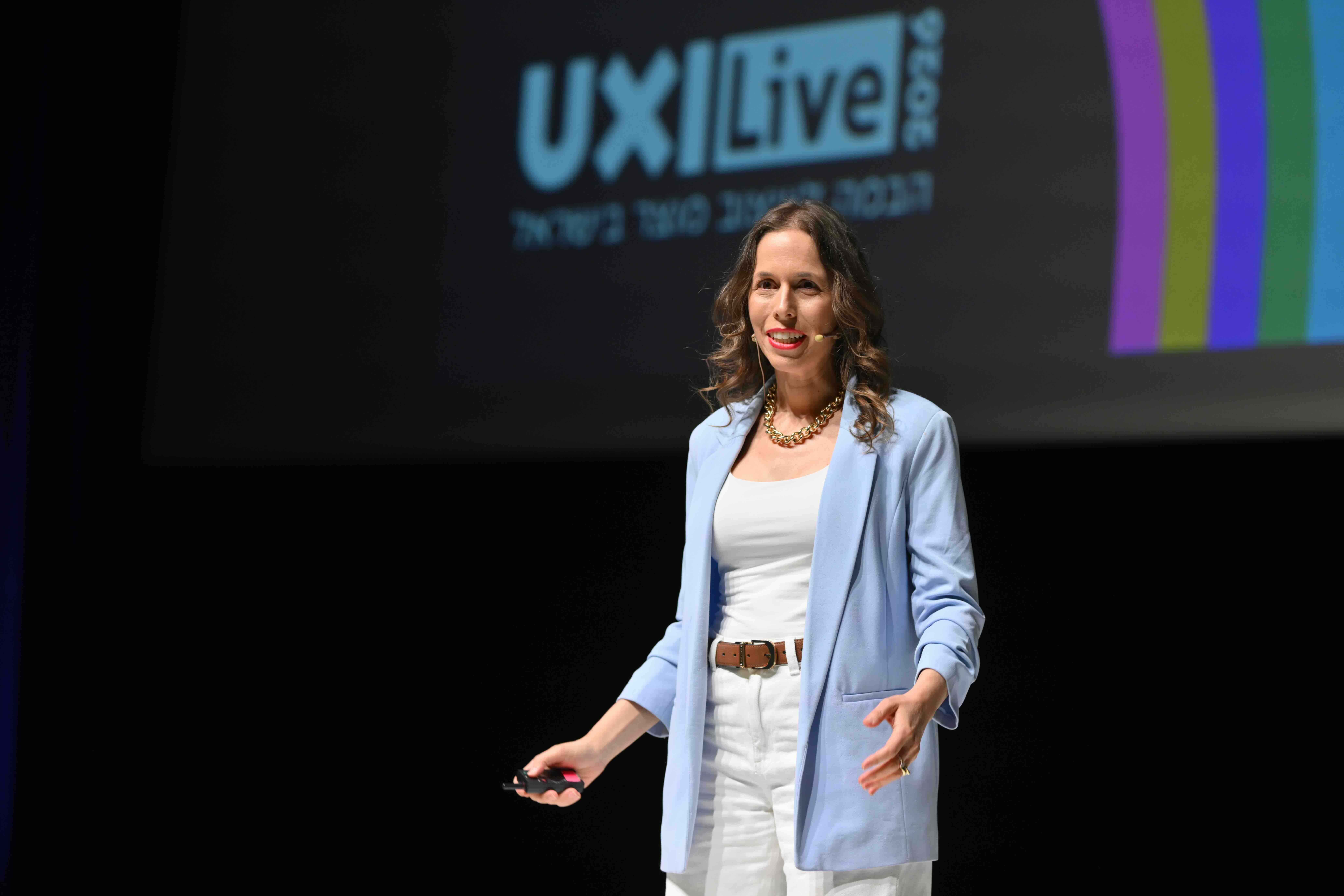 Maayan Sinai speaking at UXI Live 2026